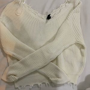 loose ripped white sweater
